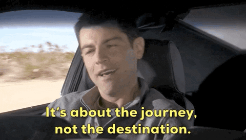 Man riding in car proclaims, “It’s about the journey, not the destination.”
