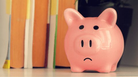 Sad piggy bank represents that overall feeling about rising costs.