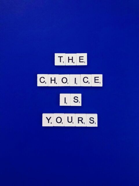 Scrabble tiles declare, “The choice is yours.”